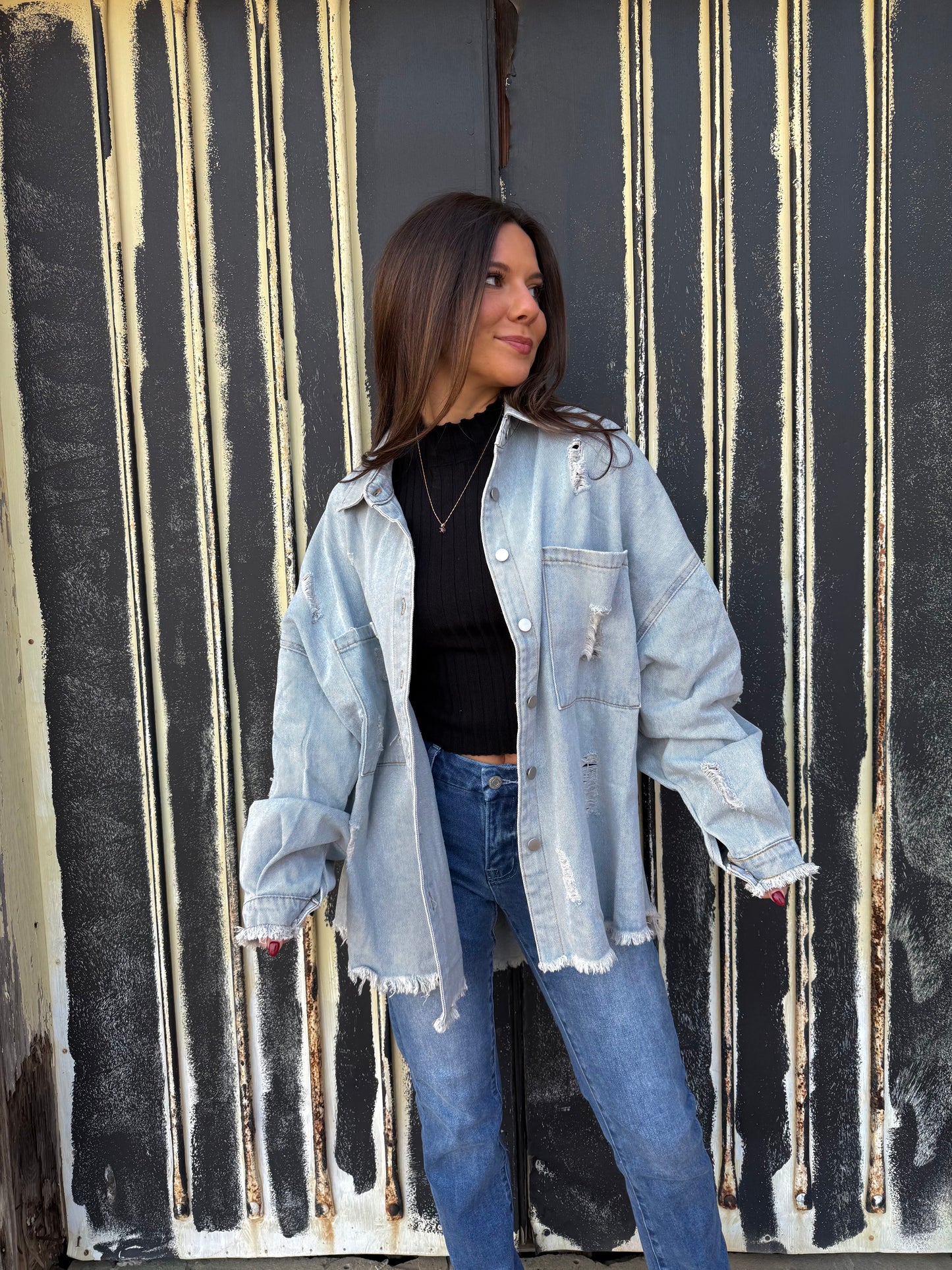Distressed denim jacket