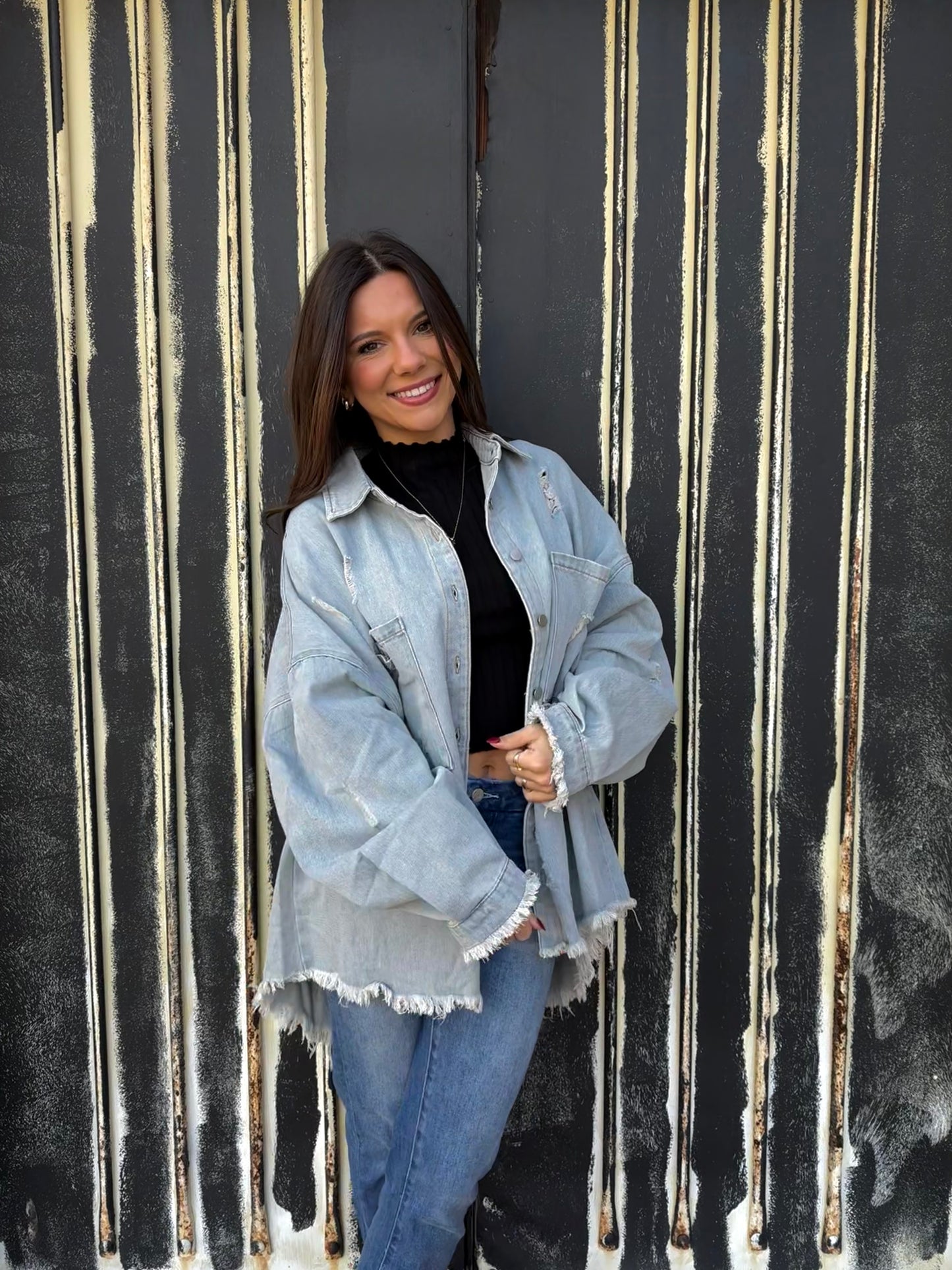 Distressed denim jacket