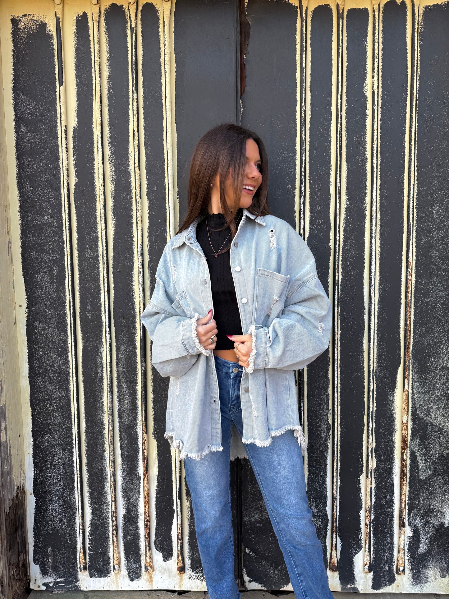 Distressed denim jacket